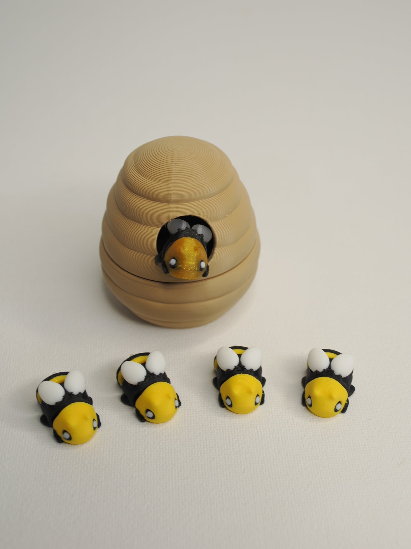 Bee hive with colony of 5 tiny flexi bees