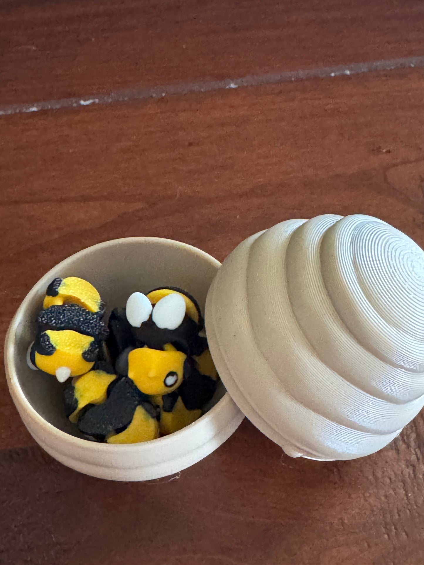 Bee hive with colony of 5 tiny flexi bees